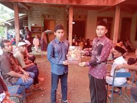 PENYERAHAN AKTA KEMATIAN IBU SAMINTEN (KADER KESEHATAN HARGOMULYO) KEPADA PIHAK KELUARGA